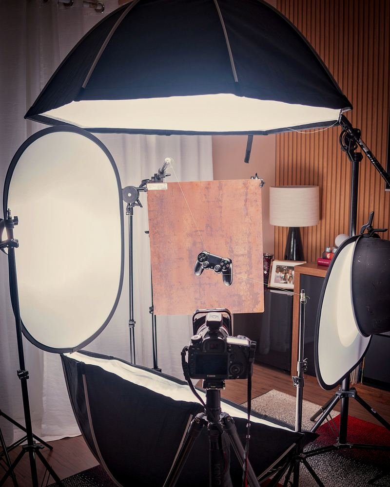 A product photo set with a camera, softbox and reflector
